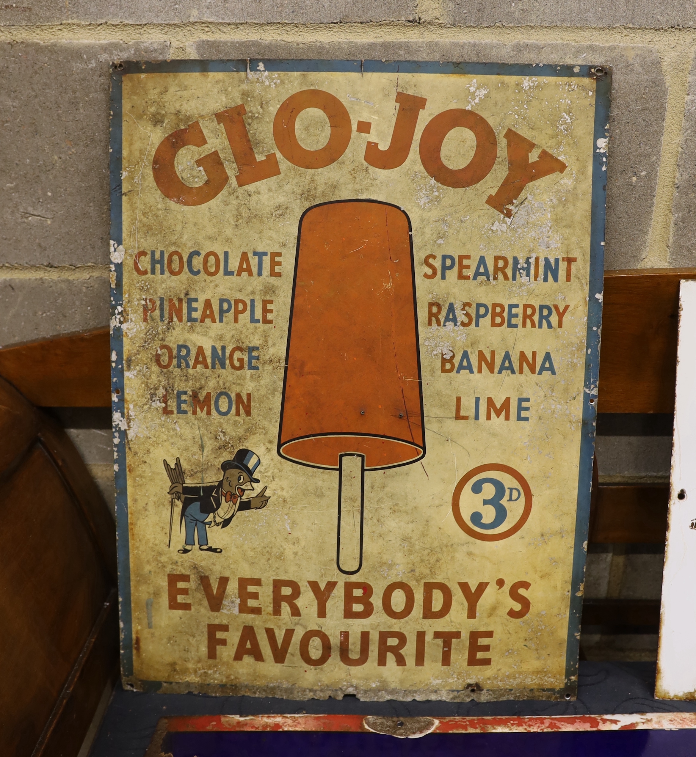 An original weathered enamel advertising sign 'Glo-Joy, Everybody's Favourite', width 46cm, height 61cm